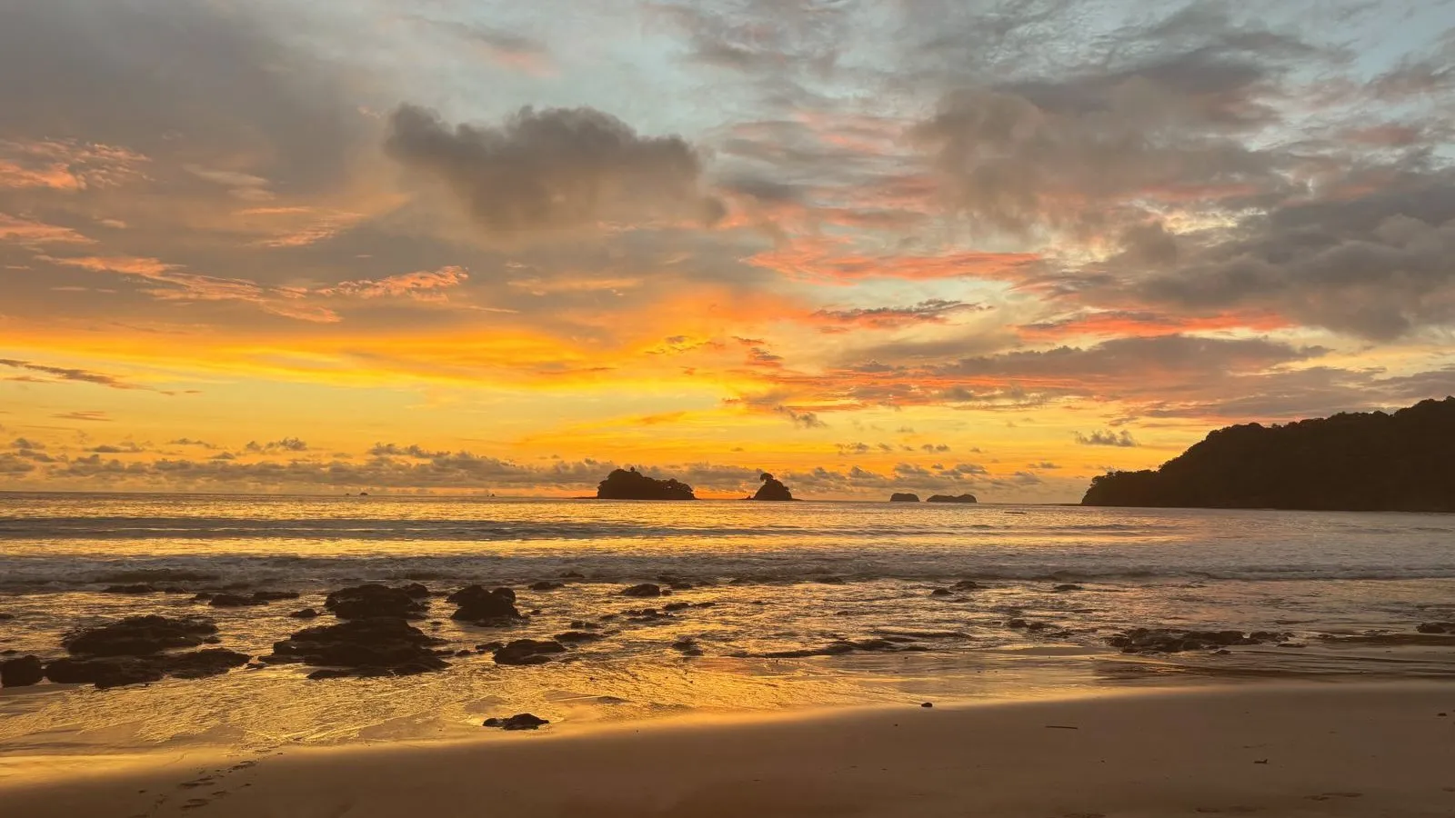 Fiery orange sunset over the ocean at Las Catalinas, Costa Rica
